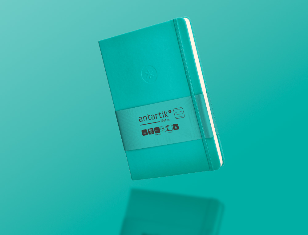 CUADERNO CON GOMILLA ANTARTIK NOTES TAPA DURA A5 HOJAS RAYAS TURQUESA 100 HOJAS 80 GR FSC